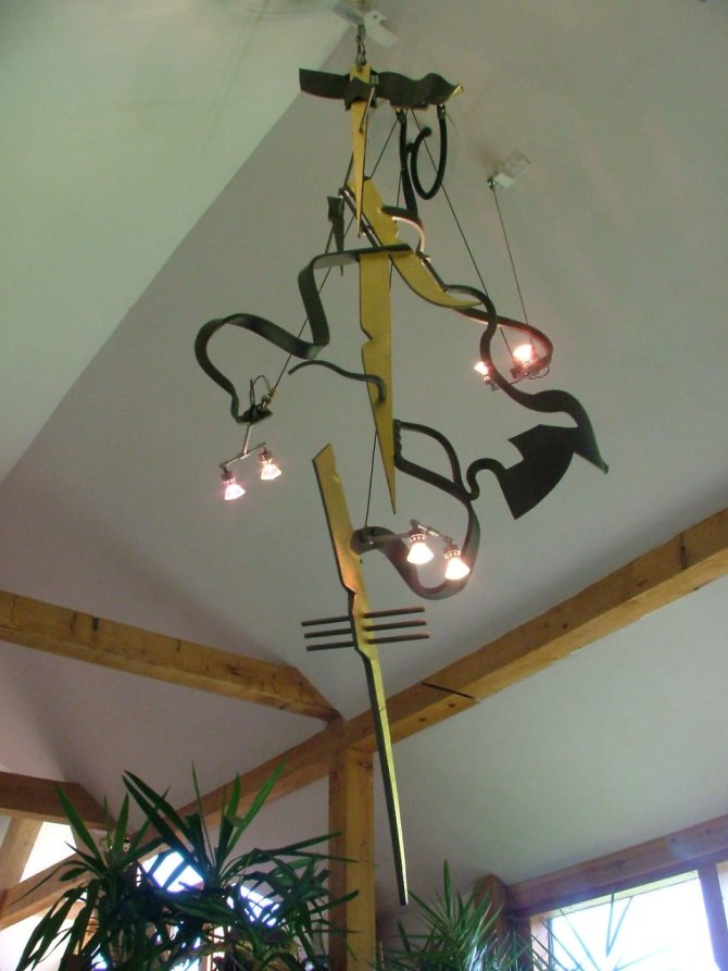 Chandelier, Forged Steel, for 12 Volt spotlamps. Lacquered & Parcel Gilt